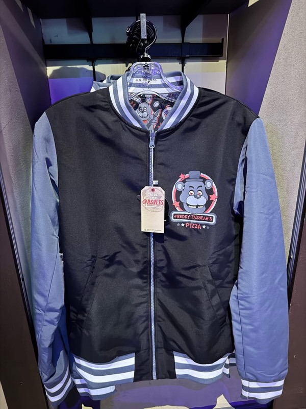 RSVLTS Freddy Fazbear’s Pizza Reversible Bomber Jacket in Black — front view