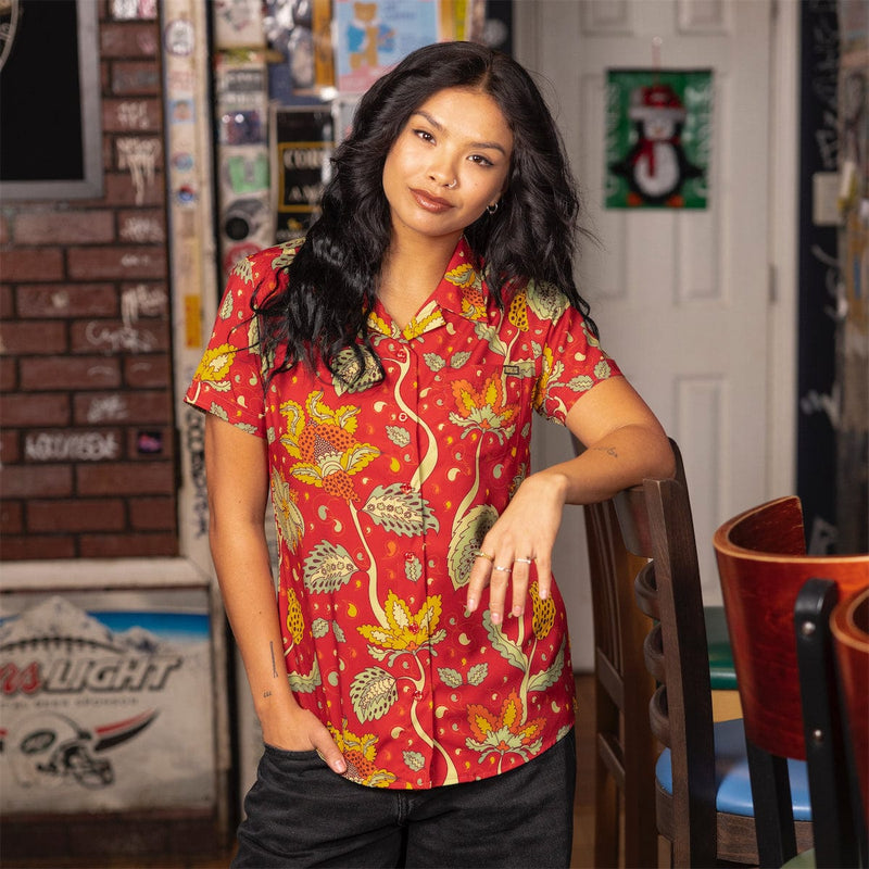RSVLTS Baba O’Redly Women's KUNUFLEX Short Sleeve Shirt in Orange — front view