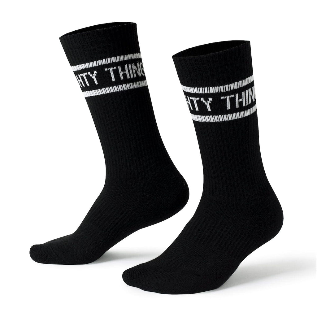 RSVLTS Dare Mighty Things (Black) Crew Socks in Black — front view