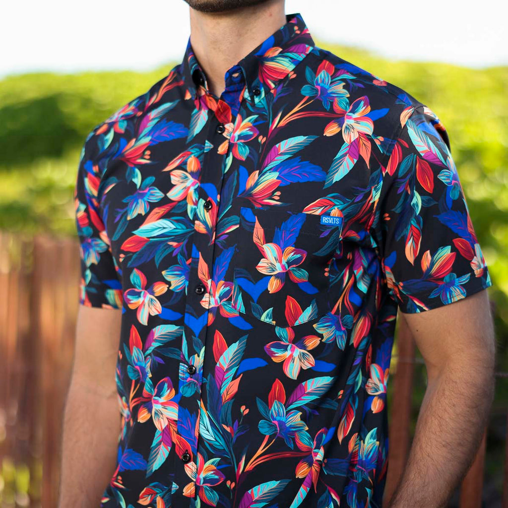 RSVLTS Vibrant Bloom KUNUFLEX Short Sleeve Shirt in Black — front view