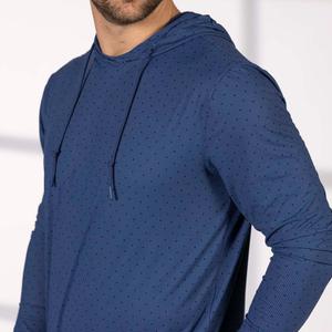 RSVLTS Static Slate Surge Performance Hoodie in Blue — front view