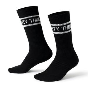 RSVLTS Dare Mighty Things (Black) Crew Socks in Black — front view