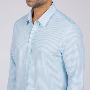 RSVLTS The Woodwind Good Looks KUNUFLEX Dress Shirt in Blue — front view