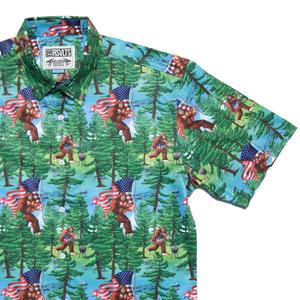 RSVLTS Smells Like Bigfoot’s Hot Dog KUNUFLEX Short Sleeve Shirt in Green — front view