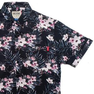RSVLTS Grandma’s Couch v1 KUNUFLEX Short Sleeve Shirt in Black — front view