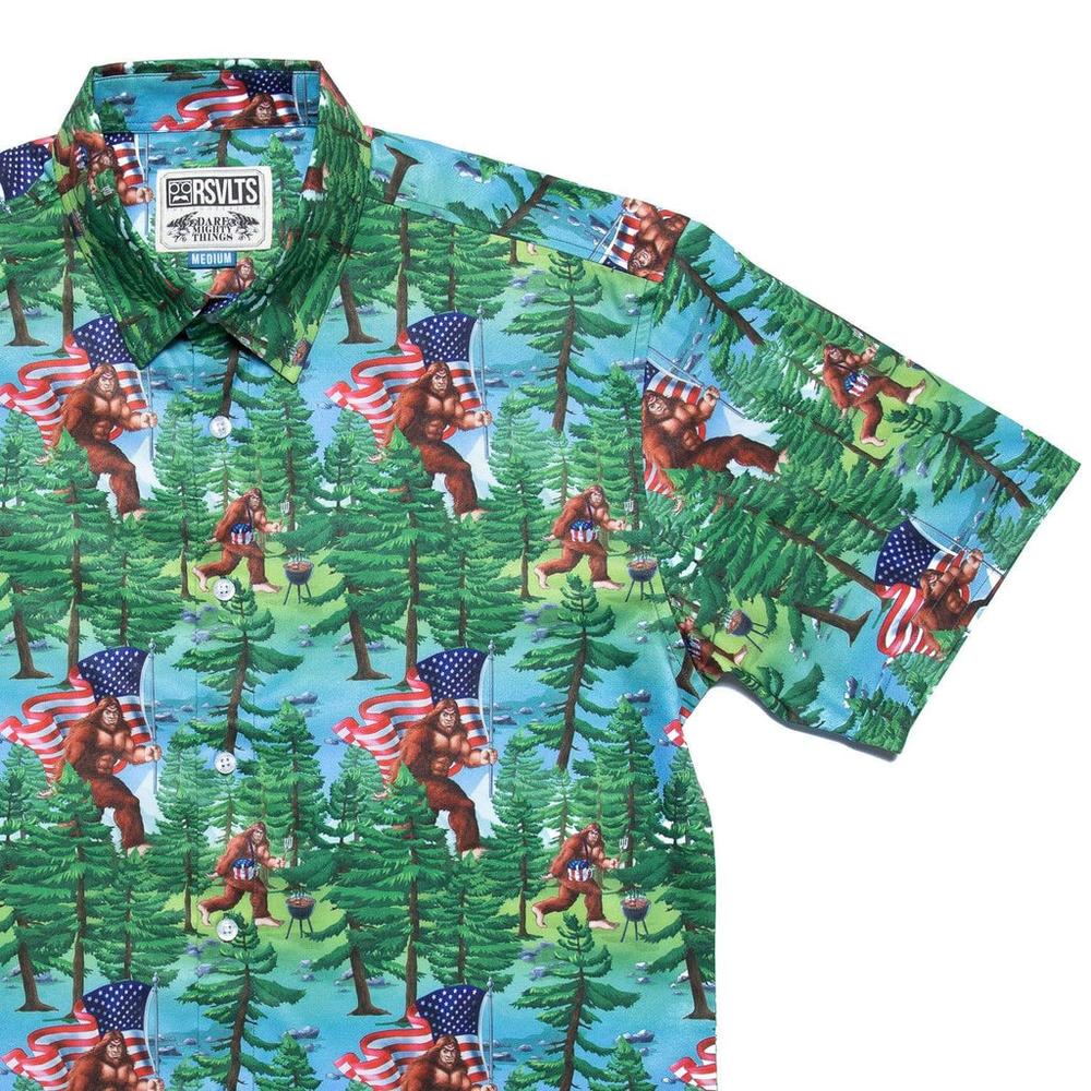 RSVLTS Smells Like Bigfoot’s Hot Dog KUNUFLEX Short Sleeve Shirt in Green — front view